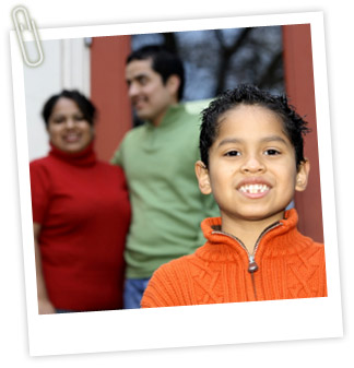 young boy with family